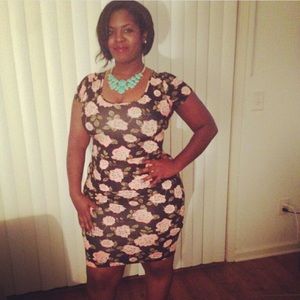 Black and pink fitted flower print dress.